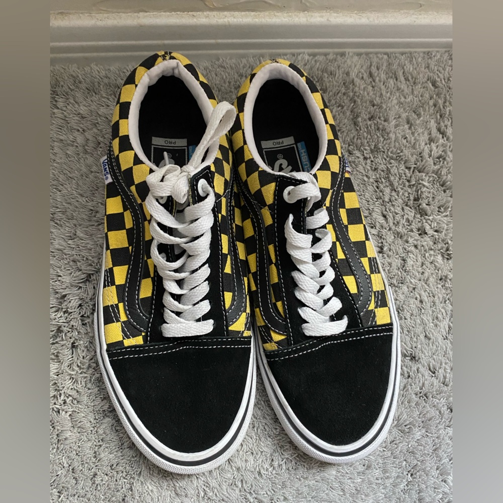 Black and yellow checkered vans